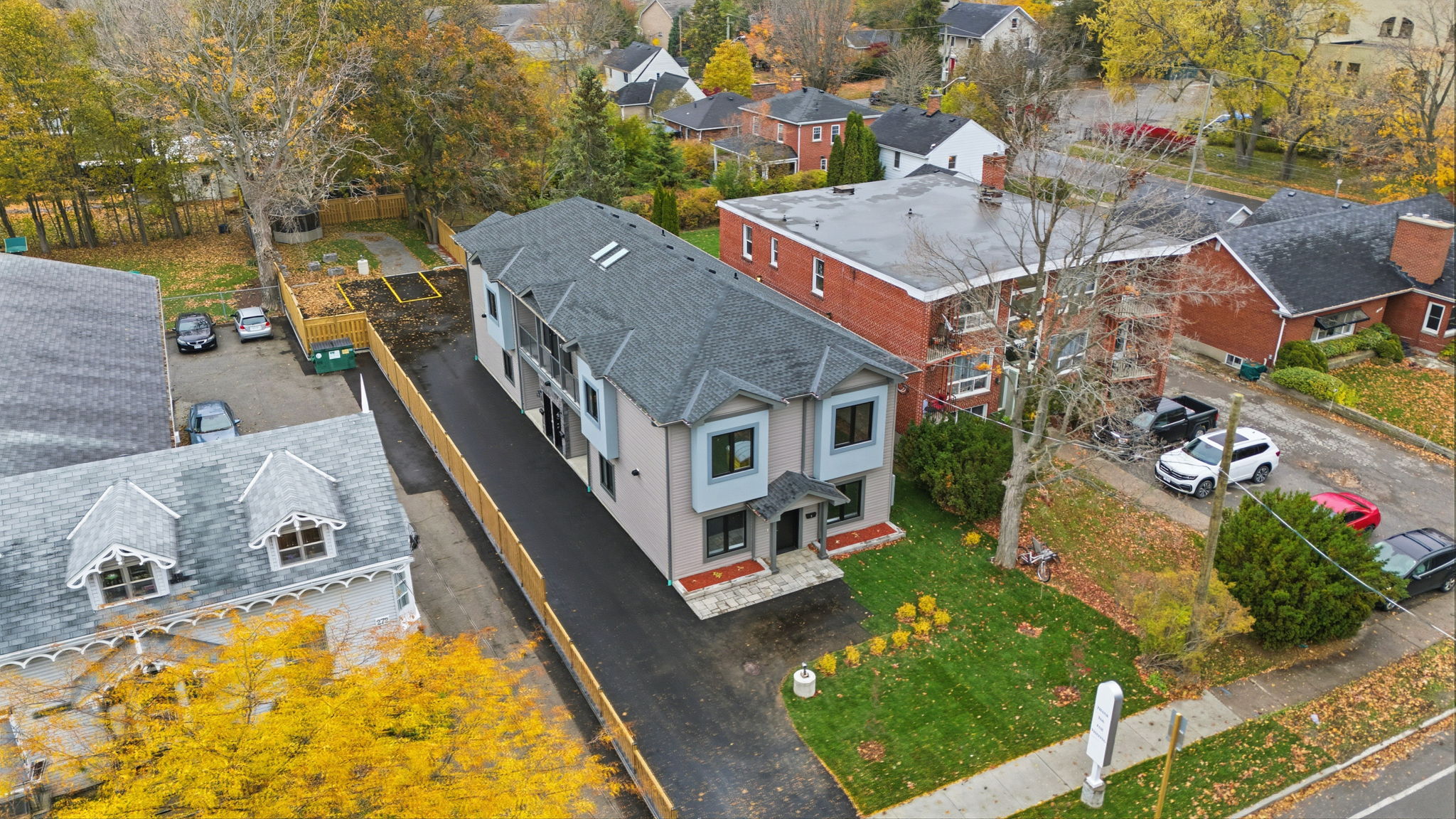 1-web-or-mls-DJI_20251103094733_0172_D front drone view of multi residential building